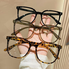 Teljes keretű, divatos, lapos, kék fényt blokkoló szemüveg